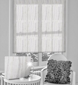 Solitaire Glint roller blinds bring sophistication and the  wow factor to airy, light-filled rooms
